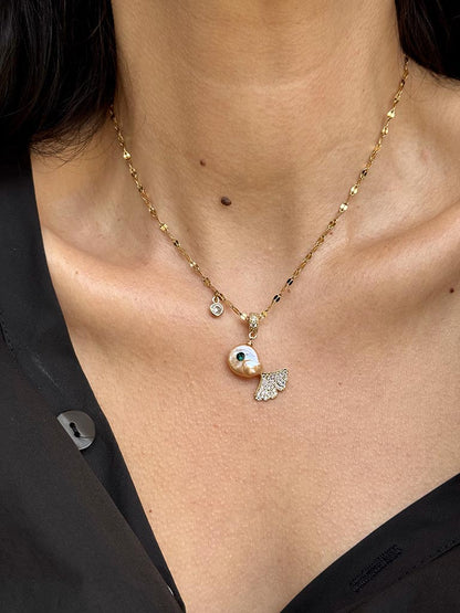 Χειροποίητο κολιέ ψαράκι από αληθινό μαργαριτάρι μπαρόκ.