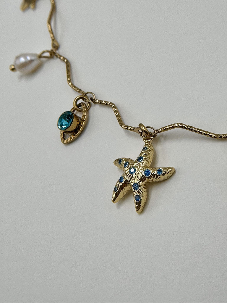 Καλοκαιρινό ατσάλινο κολιέ με κρεμαστά charms